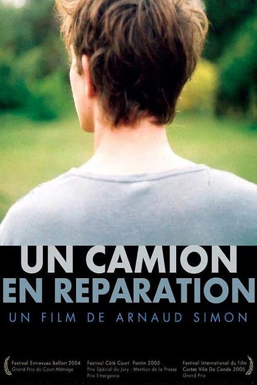 Постер: Un camion en réparation